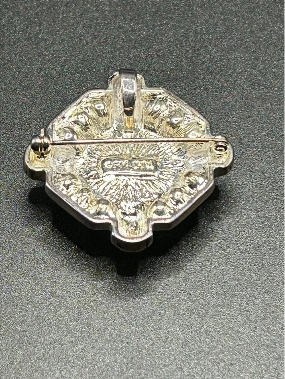 vintage 1950s fm silver tone pearl color center surrounded by rhinestones brooch